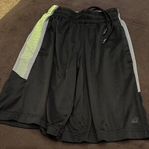 New Balance boys Black Shorts with Gray and Green Accents athletic youth small 8